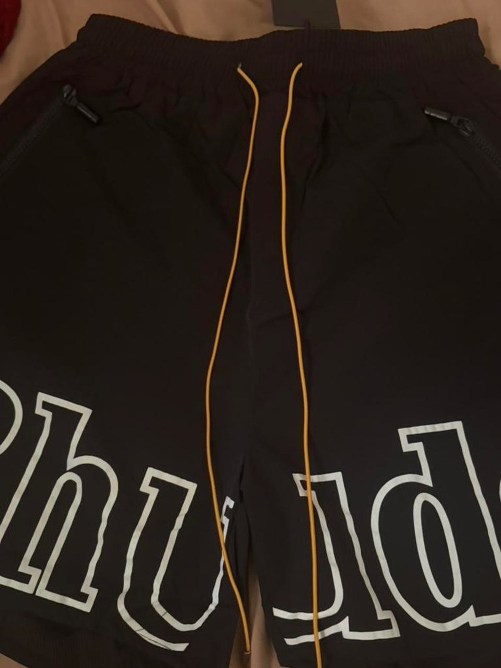 Rhude Black Athletic Shorts with Yellow Drawstring and White Logo